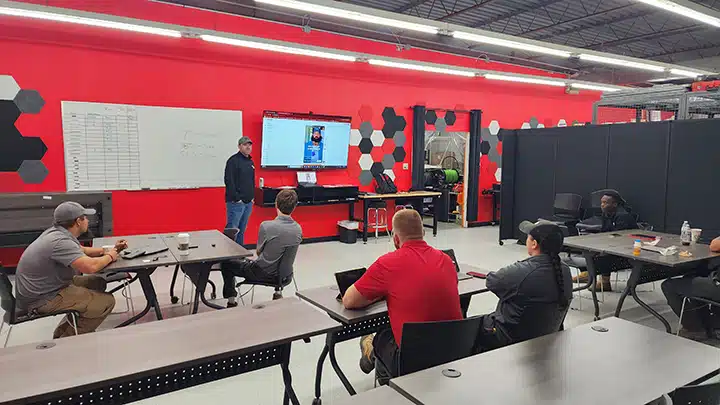 Spartan Plumbing team in a meeting in Dayton, OH.