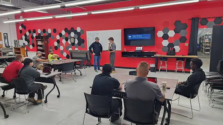 Spartan Plumbing team in a meeting in Dayton, OH.