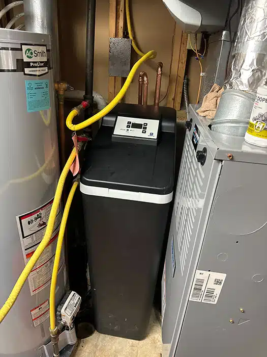 Whole home filtration system next to boiler and furnace in Dayton, OH.